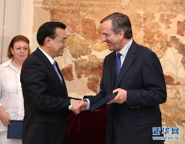 6月21日，國務院總理李克強與希臘總理薩馬拉斯共同出席希臘伊拉克利翁博物館新館開館儀式并發(fā)表講話。 新華社記者 龐興雷 攝
