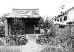 這間9.6平方米的小屋（畫圈處）將文物修繕工程攔停了下來。