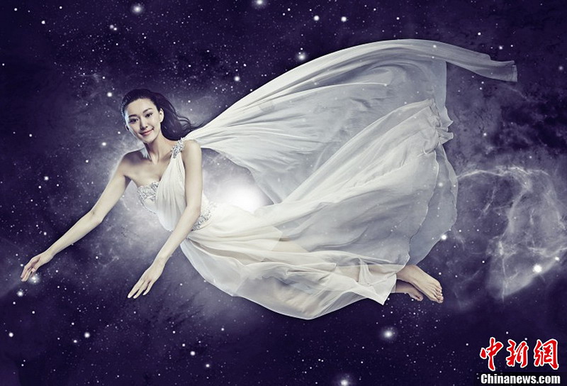 圖為2013世界小姐中國區(qū)總決賽冠軍直通賽佳麗——苗婷。